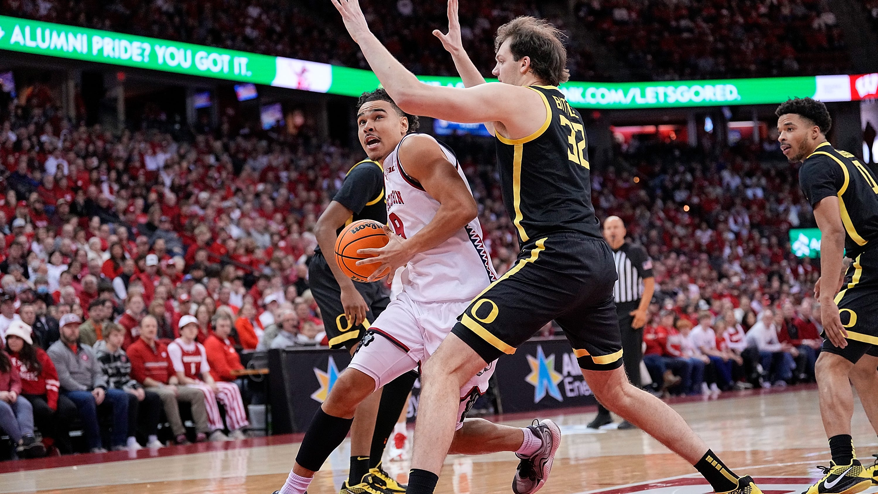 Wisconsin Basketball Stumbles Against [Opponent]:  Lessons Learned